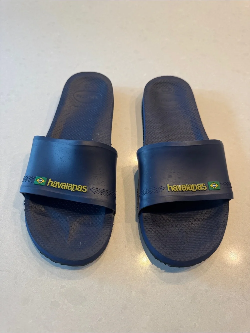 Havaianas Navy Blue Slide Sandals with Yellow Logo